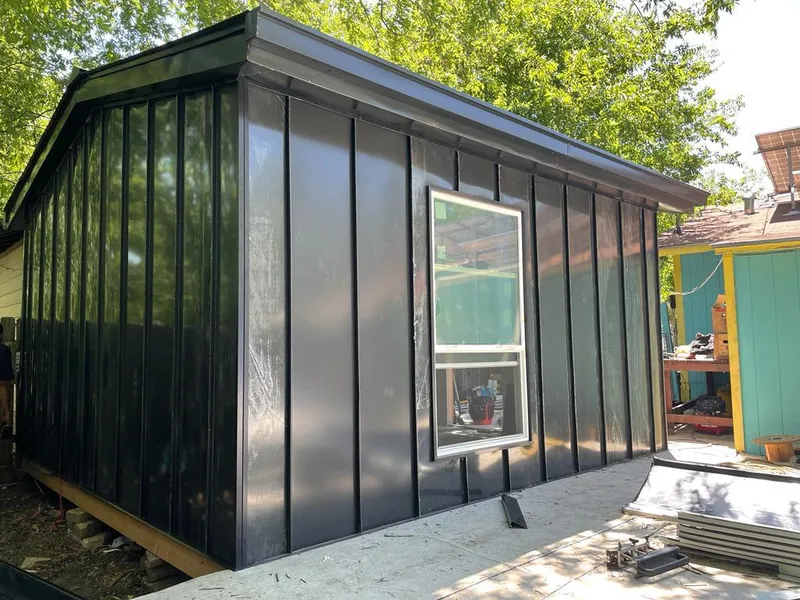 Black standing seam metal wall panels for Roof Inspection in New Providence